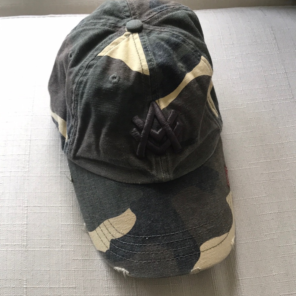 A Kurtz camo adjustable back baseball hat cap